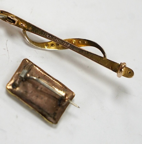 A Victorian gilt metal and plaited hair mourning brooch, 18mm and a yellow metal and seed pearl set bar brooch. Condition - poor